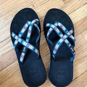 Teva Women's Black Slip On Sandals with Blue Geometric Patterned Straps Size 6